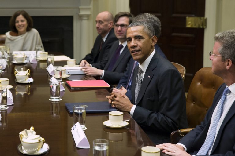 President Barack Obama meets with financial regulators for a discussion on the economy and to receive an update on implementation of Wall Street Reform, Monday, Oct. 6, 2014, in the Roosevelt Room of the White House in Washington. (AP Photo/Evan Vucci)