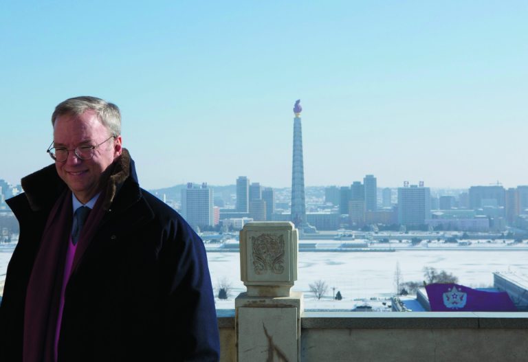 Executive Chairman of Google, Eric Schmidt stands on a balcony at the Grand Peoples Study House overlooking Juche Tower in Pyongyang, North Korea on Wednesday, Jan. 9, 2013. Schmidt and former Governor of New Mexico Bill Richardson are currently in North Korea. Richardson said Wednesday that his delegation is pressing North Korea to put a moratorium on missile launches and nuclear tests and to allow more cell phones and an open Internet for its citizens. (AP Photo/David Guttenfelder)