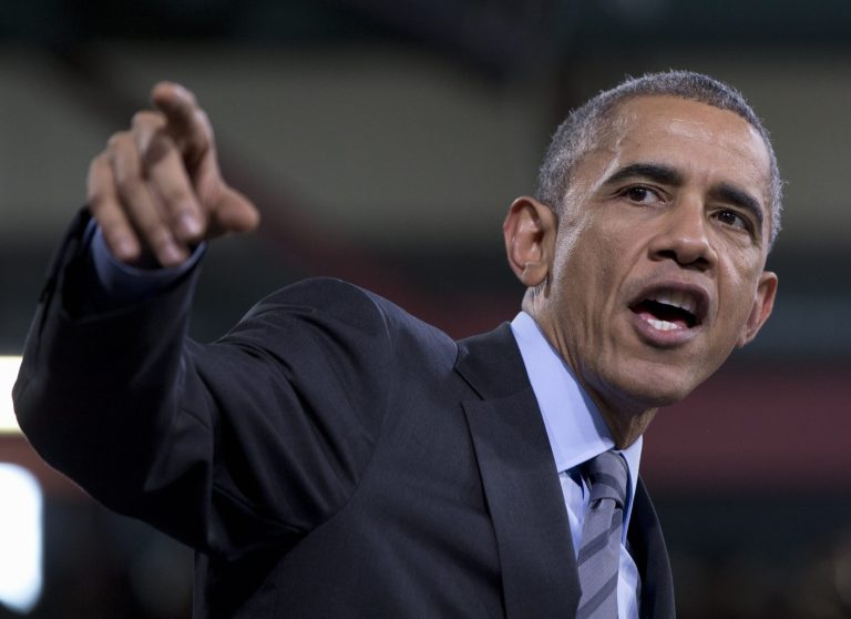 President Barack Obama speaks about immigration, Friday, Nov. 21, 2014, at Del Sol High School in Las Vegas. The president unveiled expansive executive actions on immigration Thursday night to spare nearly 5 million people in the U.S. illegally from deportation, setting off a fierce fight with Republicans over the limits of presidential powers. (AP Photo/Carolyn Kaster)