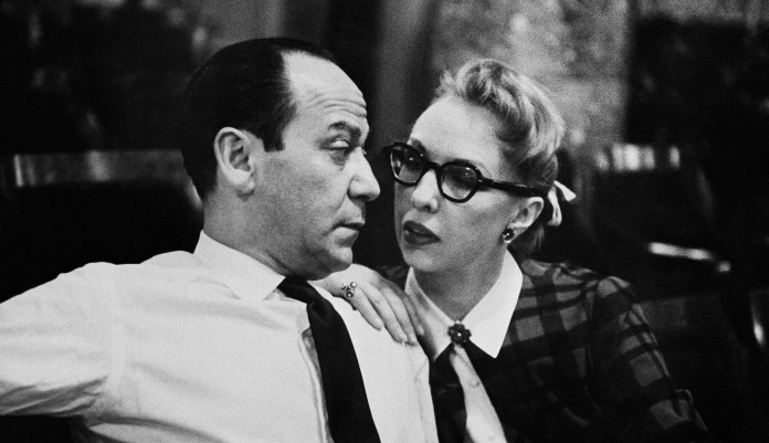 Broadway composer Frank Loesser and his wife and musical partner Lynn are shown, April 26, 1956 in New York. Their song "Baby, It's Cold Outside" was originally a song they performed for friends at their housewarming party. (AP Photo/Anthony Camerano)