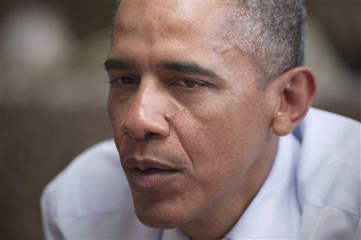 President Barack Obama has a quiet lunch with a small group of supporters at a restaurant in Washington on Friday.