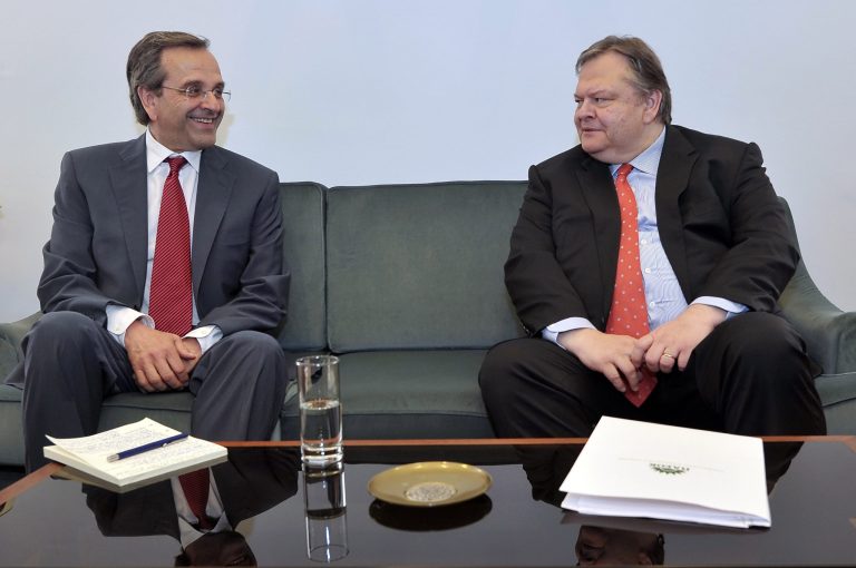  Leader of the New Democracy conservative party Antonis Samaras, left, meets with Evangelos Venizelos, the head of the Socialist PASOK party at the Greek parliament, in Athens, on Monday, June 18, 2012. Samaras, who came first in Sunday's national election, said he will meet with leaders of all parties 