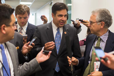 Rep. RaÃºl Labrador, an Idaho Republican, speaks with reporters as he leaves a conference-wide meeting on immigration on Wednesday. (Graeme Jennings/Washington Examiner)