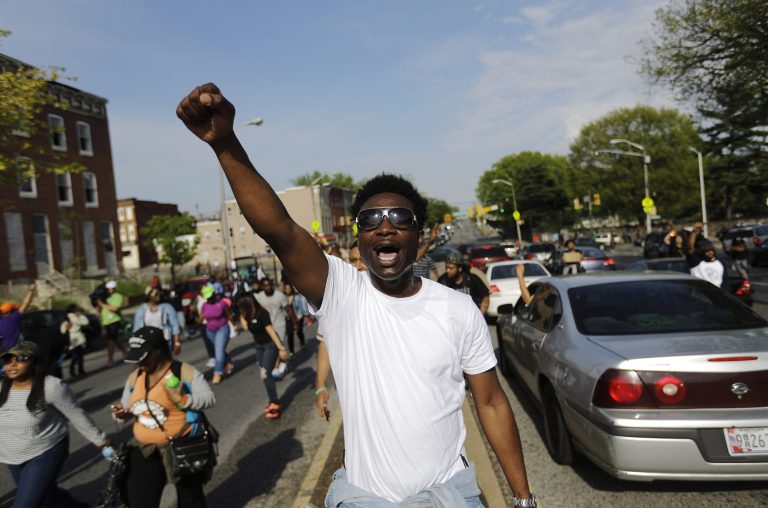 David Manigault chants while marching toward City Hall to demonstrate the police-custody death of Freddie Gray, Thursday, April 30, 2015, in Baltimore. (AP Photo)Â 
