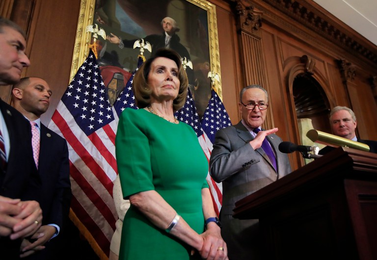 Senate Minority Leader Charles Schumer of N.Y., with, from left, Rep. John Yarmuth, D-Ky.; Rep. Hakeem Jeffries, D-N.Y.; House Minority Leader Nancy Pelosi of Calif. and Sen. Chris Van Hollen, D-Md., speaks to reporters about President Donald Trump's first 100 days, during a news conference on Capitol Hill in Washington, Friday, April 28, 2017. On Friday, the House easily passed a one-week spending bill to avert partial government shutdown at midnight, Senate votes next. (AP Photo/Manuel Balce Ceneta)