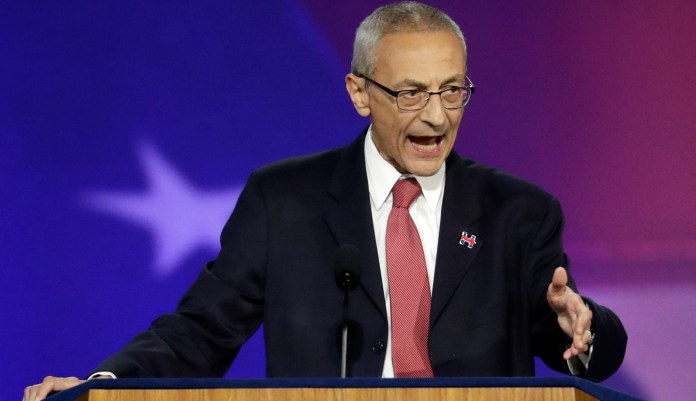 "Not bad enough that I was the victim of a massive cyber crime directed by the Russian President," Podesta wrote on Twitter Tuesday. "Now I'm the victim of a big lie campaign by the American President." (AP Photo/Patrick Semansky, File)