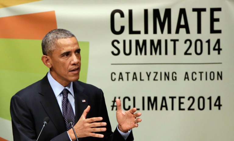 United States President Barack Obama addresses the Climate Summit, at United Nations headquarters, Tuesday, Sept. 23, 2014. (AP Photo/Richard Drew)