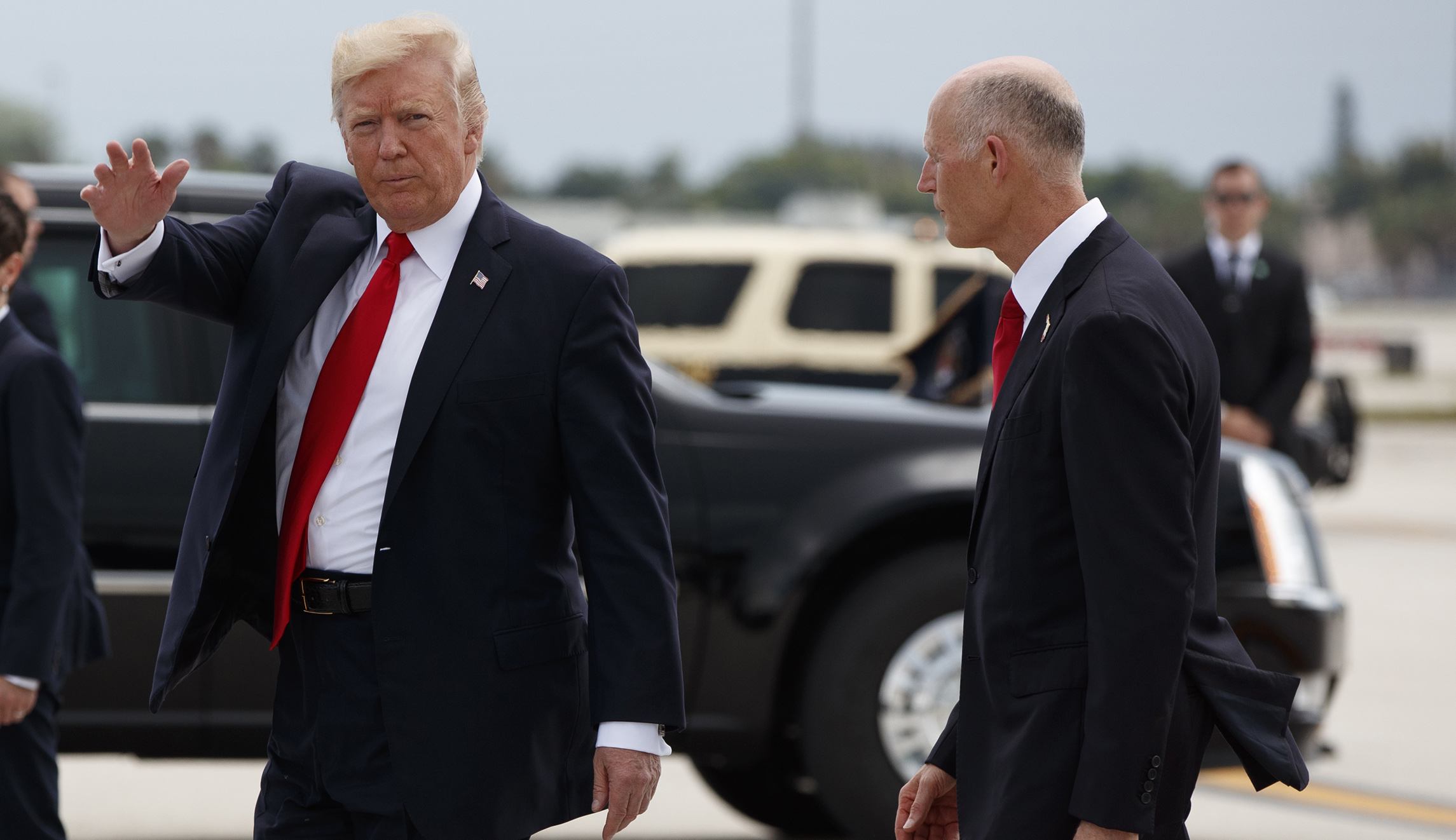 Trump urges Florida Gov. Rick Scott to run for Senate during visit to survey Hurricane Irma damage