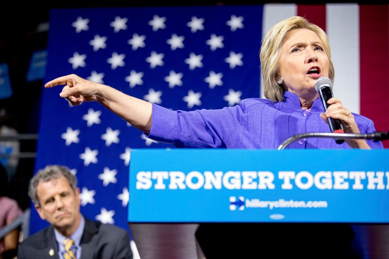 Hillary Clinton, accompanied by Sen. Sherrod Brown, D-Ohio, speaks at a rally the University of Cincinnati. (AP Photo/Andrew Harnik)