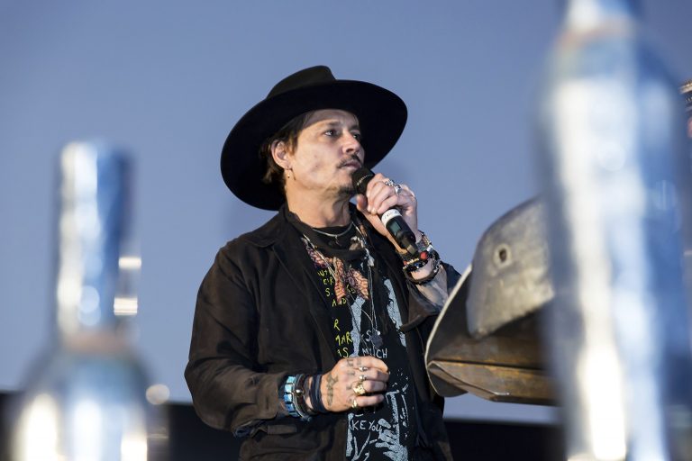 Johnny Depp's joke about assassinating President Trump drew cheers from the crowd at the Glastonbury Festival in Somerset, England. (Photo by Grant Pollard/Invision/AP)