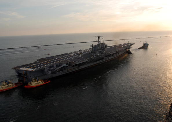 A decommissioned aircraft carrier en route to Norfolk (Getty Images)