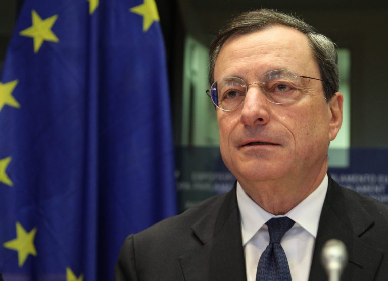   President of the European Central Bank Mario Draghi addresses the Committee on Economic and Monetary Affairs, at the European Parliament building, in Brussels on Monday, Dec. 17, 2012. (AP Photo/Yves Logghe)  