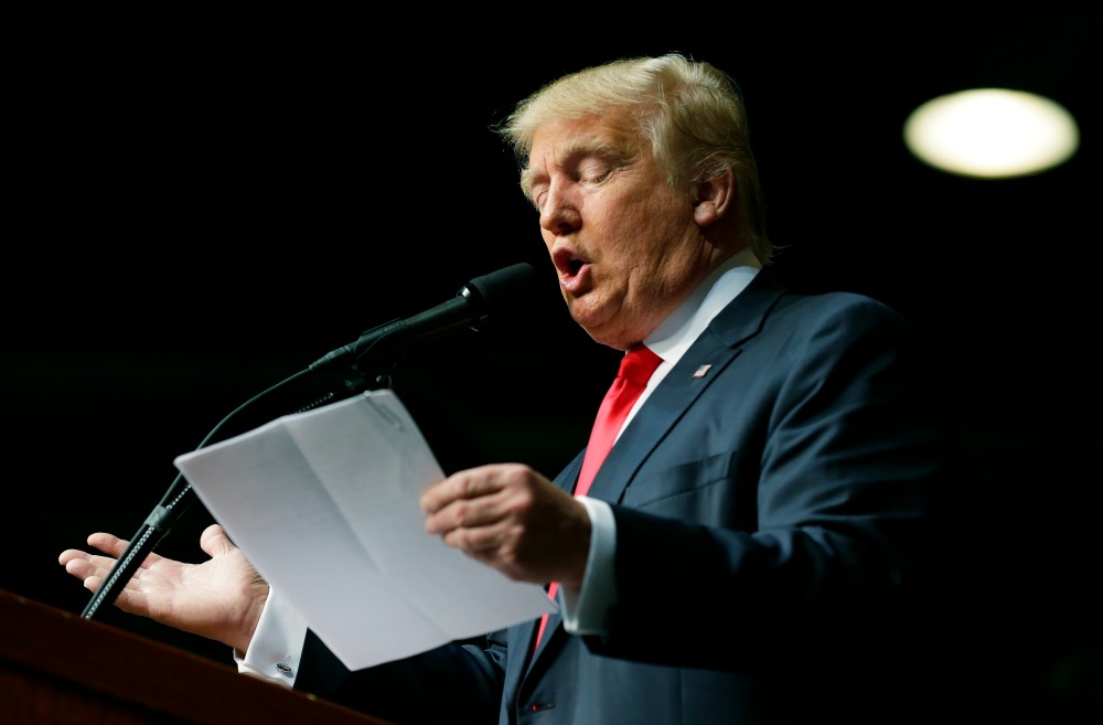 Trump slams report that (he says) has him backing carbon tax