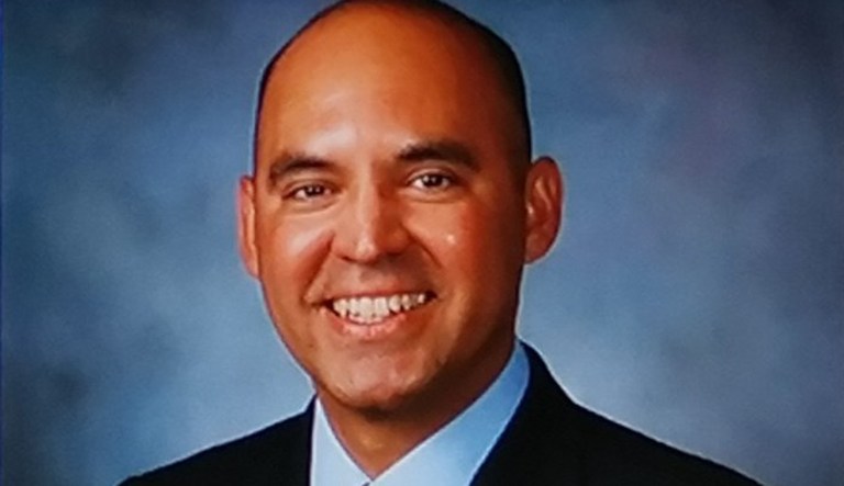 In the video, Gregory Salcido can be heard repeatedly warning students not to join the military, which he says has been unable to win wars in Iraq or Afghanistan because of the poor quality of its troops. (Image courtesy screenshot)