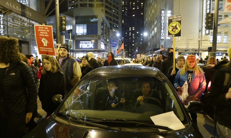 Drivers exercising care would be immune from civil suits. (AP Photo/Ted S. Warren)