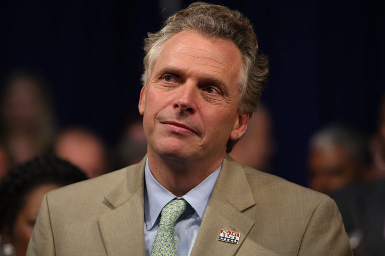 NEW YORK - JUNE 03:  Terry McAuliffe, campaign chairman for Democratic presidential hopeful Hillary Clinton, looks on as Clinton speaks to supporters at the final primary night party June 3, 2008 at Baruch College in New York City. The senator from New York spoke to supporters following the final presidential primaries in Montana and South Dakota. Clinton did not officially end her campaign, even though opponent Sen. Barack Obama (D-IL) has earned enough delegates to clinch the nomination.   (Photo by Justin Sullivan/Getty Images)