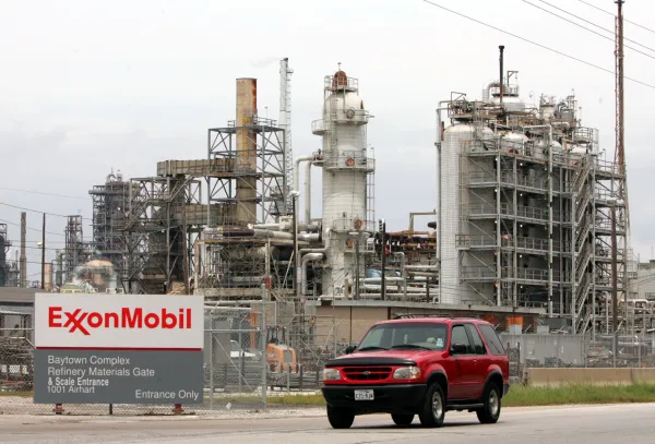 Energy groups merge, creating one oil and gas giant