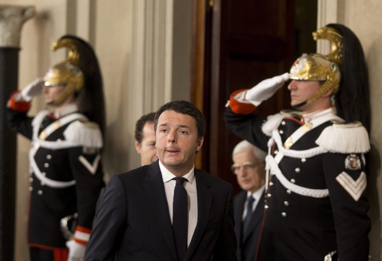 Cuirassiers presidential guards salute as Italian Democratic Party's leader Matteo Renzi arrives to meet journalists at the Quirinale presidential palace after talks with Italan President Giorgio Napolitano, in Rome, Monday, Feb. 17, 2014. Renzi was asked to form a new government to replace the one he sacked through a stunning power-grab within his own party. Renzi drove himself to his meeting with Napolitano, mimicking the down-to-earth approach of his predecessor, Enrico Letta.(AP Photo/Alessandra Tarantino)