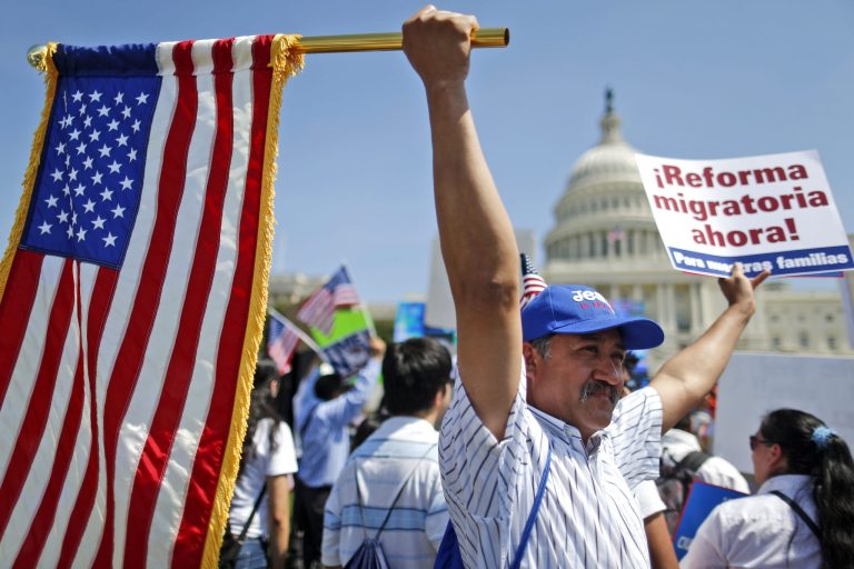 Rigoberto Ramos, of Seaford, Del., and originally from Guatemala, rallies for immigration reform in front of the Capitol in Washington on April 10. (AP Photo/Charles Dharapak)