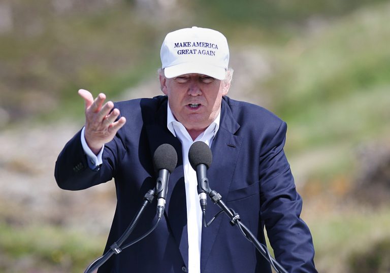 Presumptive GOP nominee amends previous statement banning all Muslims. (Andrew Milligan/PA via AP)