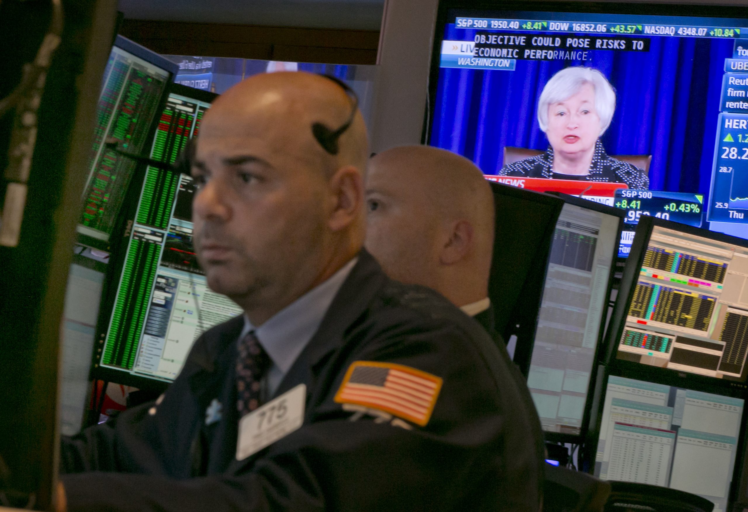 Stocks edge higher after Fed trims bond purchases