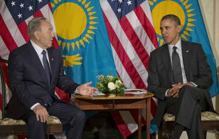 US President Barack Obama, right, meets with Kazakhstan President Nursultan Nazarbayev, left, at the US AmbassadorÃ?s Residence in The Hague, Netherlands, Tuesday, March 25, 2014. (AP Photo/Pablo Martinez Monsivais)