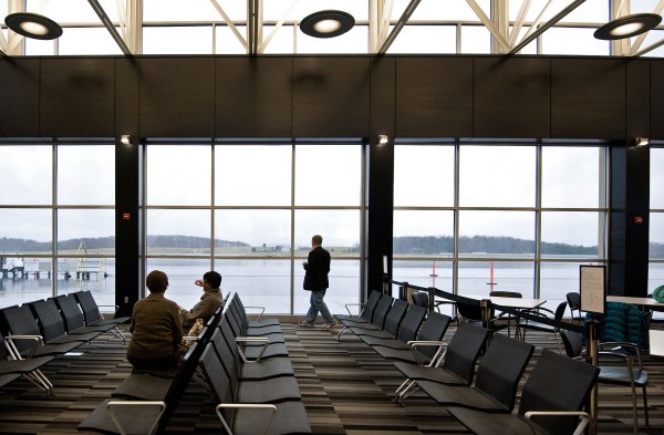 Flying high: Members of Congress get free reserved parking as well as first-class flights