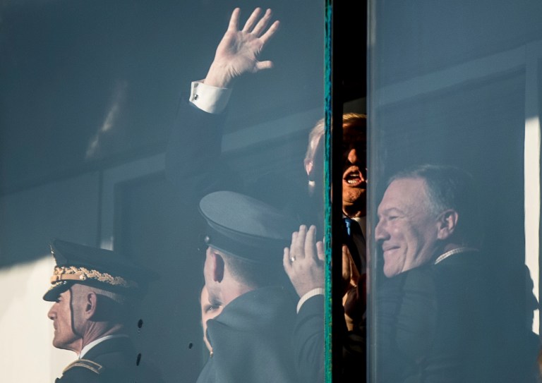 Trump tries to make football great again. (AP Photo/Andrew Harnik)