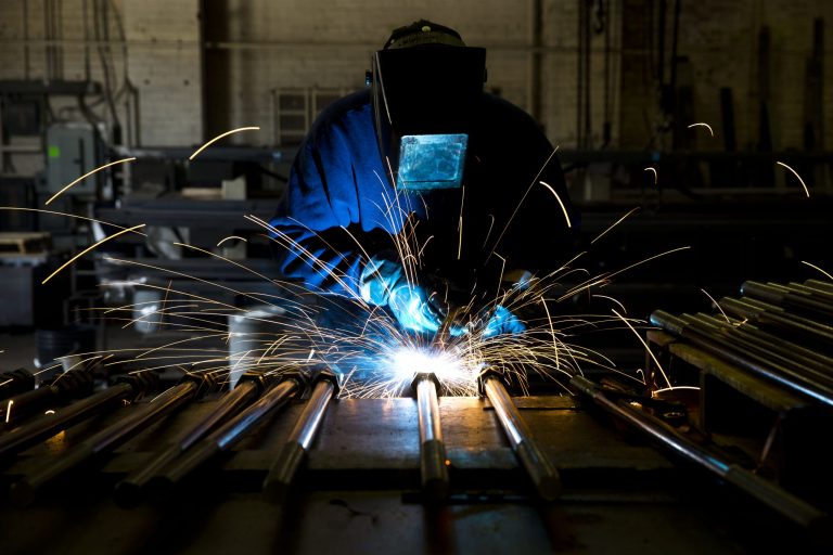 In this July 16, 2014 photo, a welder fabricates anchor bolts for roads and bridges at the custom manufacturer Fox Company Inc. in Philadelphia. The Institute for Supply Management, a trade group of purchasing managers, issues its index of manufacturing activity for July on Friday, Aug. 1, 2014. (AP Photo/Matt Rourke)