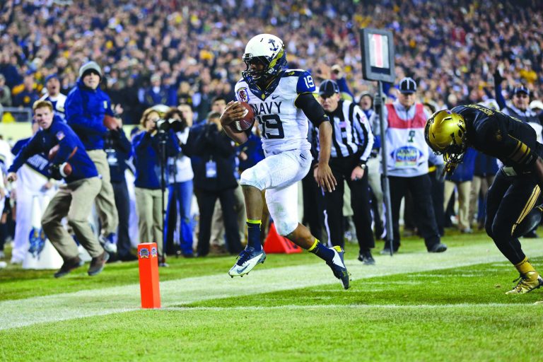 Matt Rourke/AP
Keenan Reynolds ran for an 8-yard touchdown with 4:41 left in the fourth quarter as Navy beat Army in Philadelphia on Saturday to reclaim the Commander-in-Chief's Trophy.