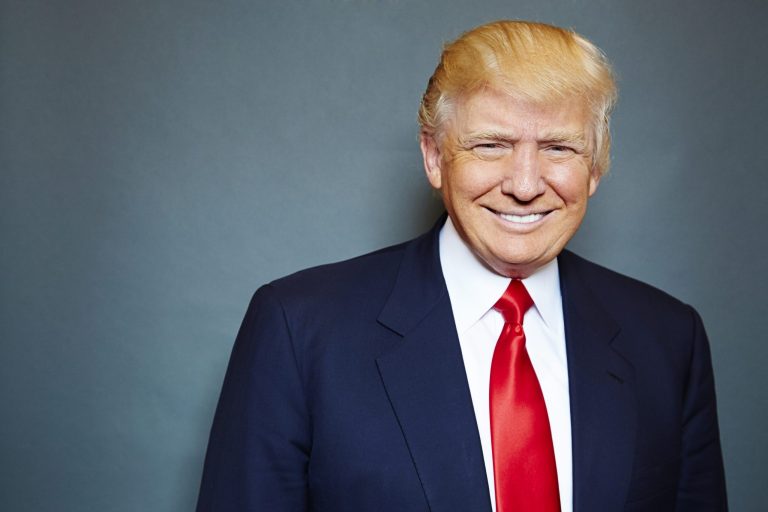Donald Trump is heading to New Hampshire, possibly to test the waters for a 2016 presidential bid. (Photo by Dan Hallman/Invision/AP)