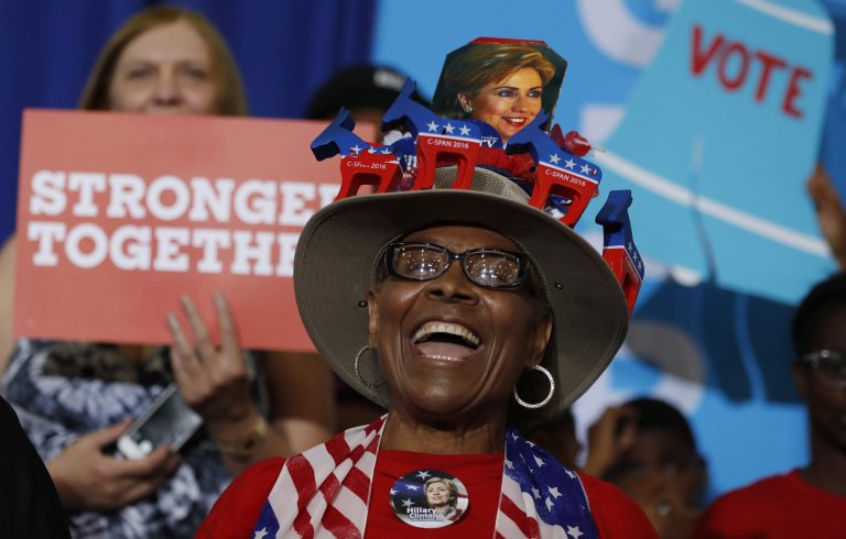 A woman cheers as Democratic presidential candidate Hillary Clinton speaks at a Pennsylvania Democratic Party voter registration event at West Philadelphia High School in Philadelphia, Tuesday, Aug. 16, 2016. (AP Photo/Carolyn Kaster)