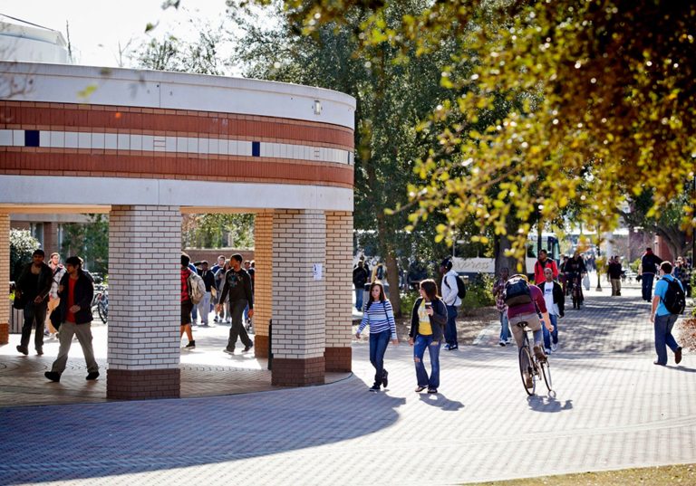   This 2012 photo provided by Georgia Southern University shows students on campus in Statesboro, Ga. School officials are hoping to use this weekâs football game against North Dakota State in Fargo to recruit a North Dakota high school student. The school has students from 49 states, but none from North Dakota. (AP Photo/Georgia Southern University, Jeremy Wilburn)  