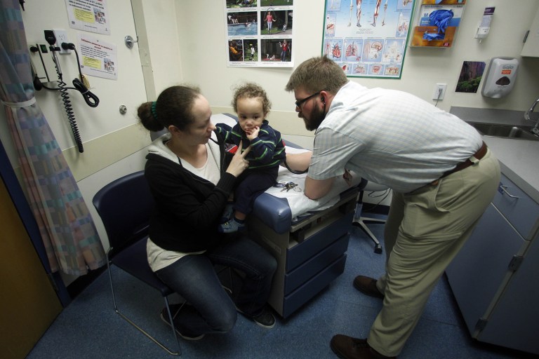 A proposal to award individuals tax credits to purchase insurance that are adjusted by age rather than income has come under criticism. (AP Photo/Rick Bowmer)