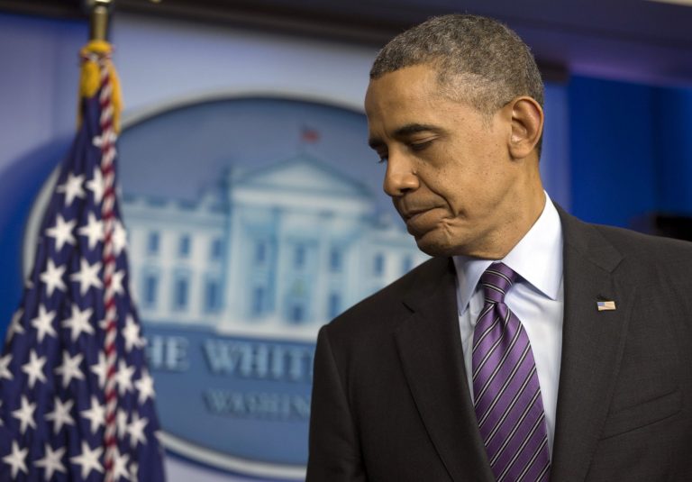 President Obama turns from the podium after speaking in the briefing room of the White House in Washington on Dec. 5. (AP Photo/Carolyn Kaster) (AP Photo/Carolyn Kaster)