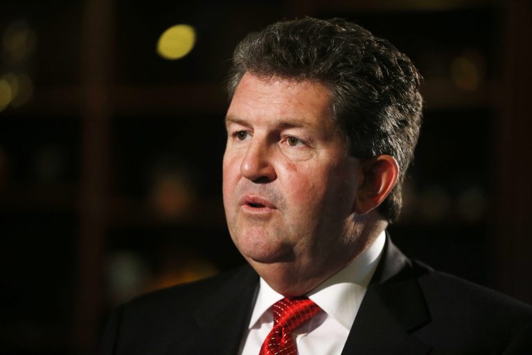 Postmaster General Patrick R. Donahoe is interviewed by the Associated Press at his office at U.S. Postal Service Headquarters in Washington, Thursday, Aug. 1, 2013. (AP Photo/Charles Dharapak)