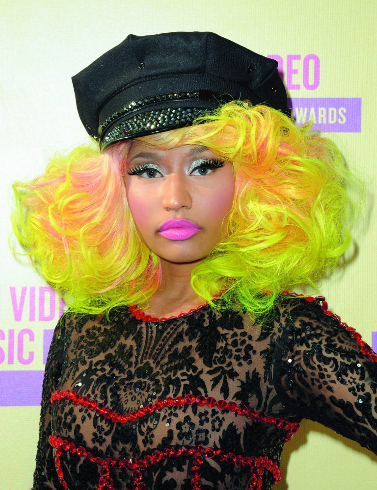 FILE - In this Thurs., Sept. 6, 2012 file photo, Nicki Minaj arrives at the MTV Video Music Awards in Los Angeles. The flamboyant rapper confirmed Monday, Sept. 10, 2012 that she did not endorse Republican nominee Mitt Romney when she rapped about him. Her comment was made Monday on Twitter in response to a radio interview given by President Barack Obama. (Photo by Jordan Strauss/Invision/AP, File)