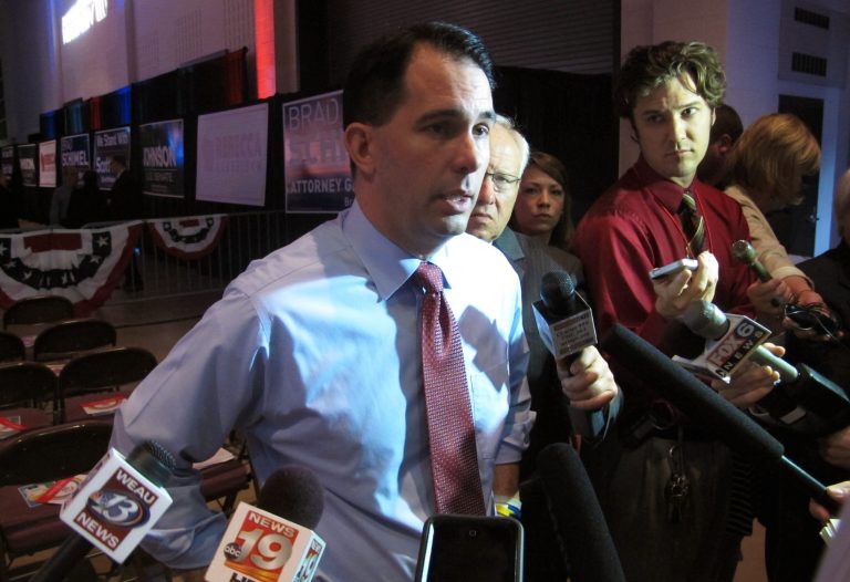 Gov. Scott Walker takes questions before his speech at the Wisconsin Republican Party convention on Saturday, May 15, 2015, in La Crosse, Wis. (AP Photo/Scott Bauer)