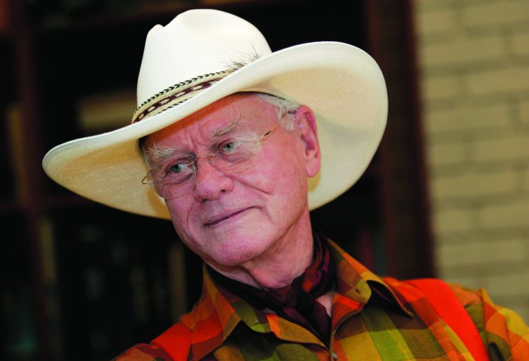 In this Thursday, Oct. 9, 2008 photo, actor Larry Hagman listens to a reporter's question while visiting the Southfork Ranch in Parker, Texas, made famous in the television show 