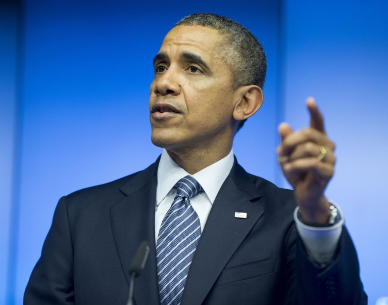 President Barack Obama speaks during a joint news conference with EU Council President Herman Van Rompuy and EU Commission President Jose Manuel Barroso at the EU-US summit meeting, Wednesday, March 26, 2014, at the EU Council building in Brussels, Belgium. Obama is on a one day trip to Belgium to shore up commitments he received from allies in The Hague, Netherlands, to reassure Eastern Europeans members of NATO that the alliance will stand by them and to make a larger point about European security a quarter-century after the fall of the Iron Curtain.(AP Photo/Pablo Martinez Monsivais)