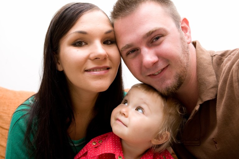 A marriage between a man and a woman provides children with mothers and fathers. (iStock)