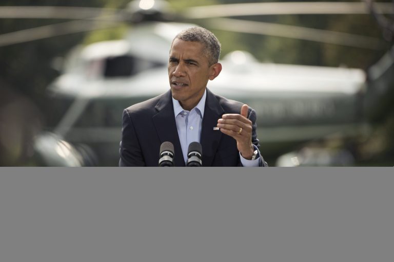 President Obama speaks on the South Lawn of the White House in Washington, Saturday, about ongoing situation in Iraq before his departure on Marine One for a vacation in Martha's Vineyard. (AP Photo/Pablo Martinez Monsivais)