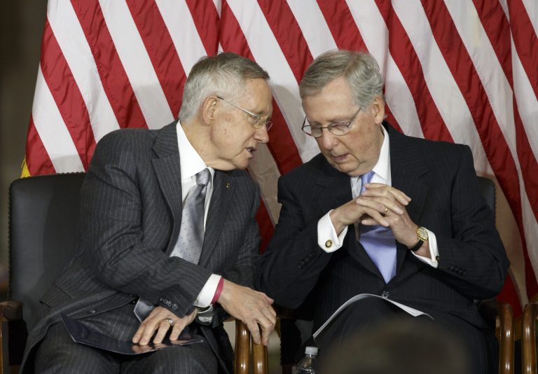 Mitch McConnell, right, has blasted Senate Majority Leader Harry Reid for wasting Senate time on a measure he knows has slim chance of passing. (AP Photo/J. Scott Applewhite)