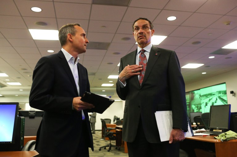 D.C. Mayor Vincent Gray, and his chief of staff, Chris Murphy, visit the Emergency Operations Center on Monday. (Graeme Jennings/Examiner photo)