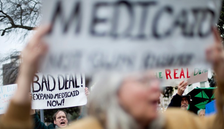 In encouraging dependency rather than personal responsibility, Obamacare's Medicaid expansion plays to the lie that all can benefit and none need suffer. (AP Photo/David Goldman)