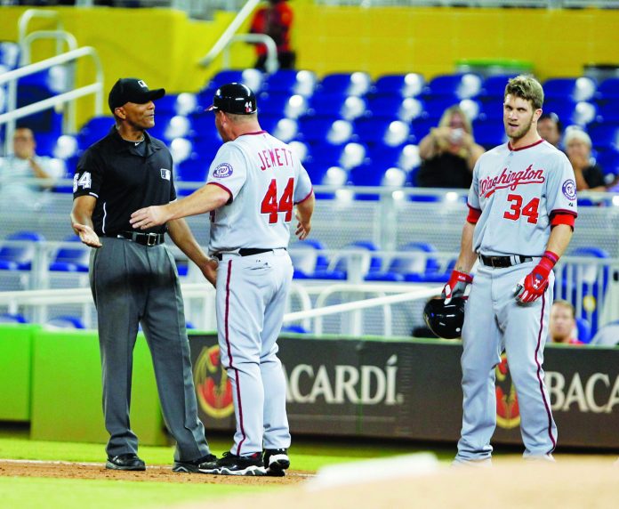 Wilfredo Lee/AP
Washington Nationals outfielder Bryce Harper was ejected in the ninth inning on Wednesday.
