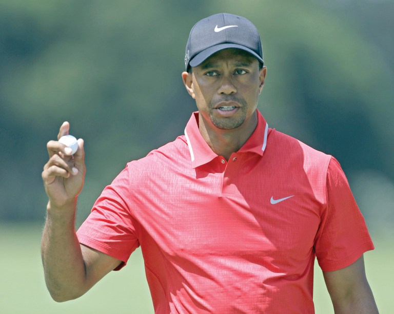 John Raoux/AP
Tiger Woods shot 2-under on Sunday to close out The Players Championship, his first win at the tournament since 2001.