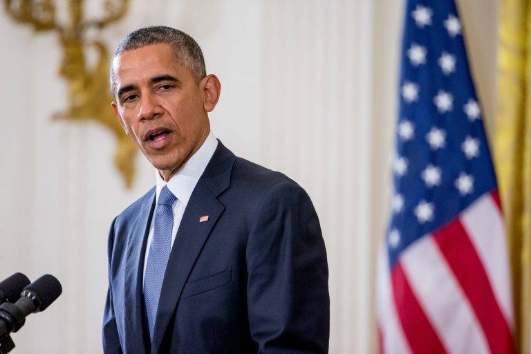 President Barack Obama, accompanied by President Francois Hollande of France, pauses while speaking during a joint press conference in the East Room at the White House in Washington, Tuesday, Nov. 24, 2015. Hollande's visit to Washington is part of a diplomatic offensive to get the international community to bolster the campaign against the Islamic State militants. (AP Photo/Andrew Harnik)