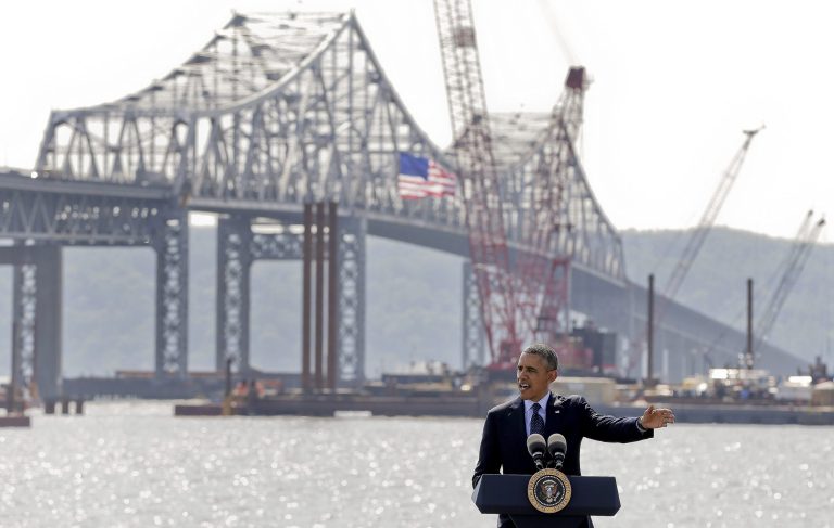 President Barack Obama speaks near the base of the Tappan Zee Bridge, Wednesday, May 14, 2014, in Tarrytown, N.Y. Obama is calling on Congress to pass a $302 billion transportation infrastructure bill that White House officials say would support millions of jobs while repairing the nation's crumbling roads and bridges. White House officials are touting the $3.9 billion Tappan Zee Bridge Replacement Project as a model for an expedited permitting and review process.(AP Photo/Julie Jacobson)