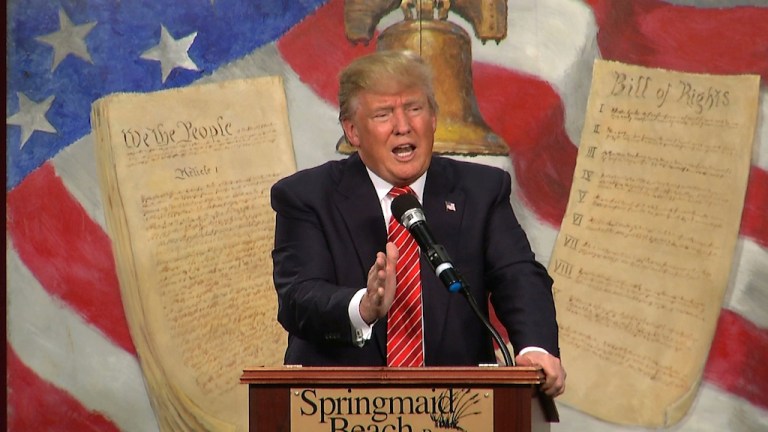 Republican presidential candidate Donald Trump speaks at the South Carolina Tea Party Convention in Myrtle Beach, S.C., where he was booed by the audience. (AP Photo/Alex Sanz)